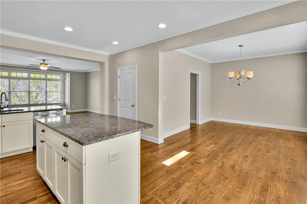 Kitchen open to great room and dining room