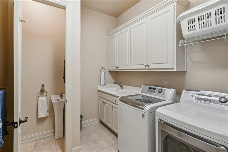 Laundry room and secondary bathroom