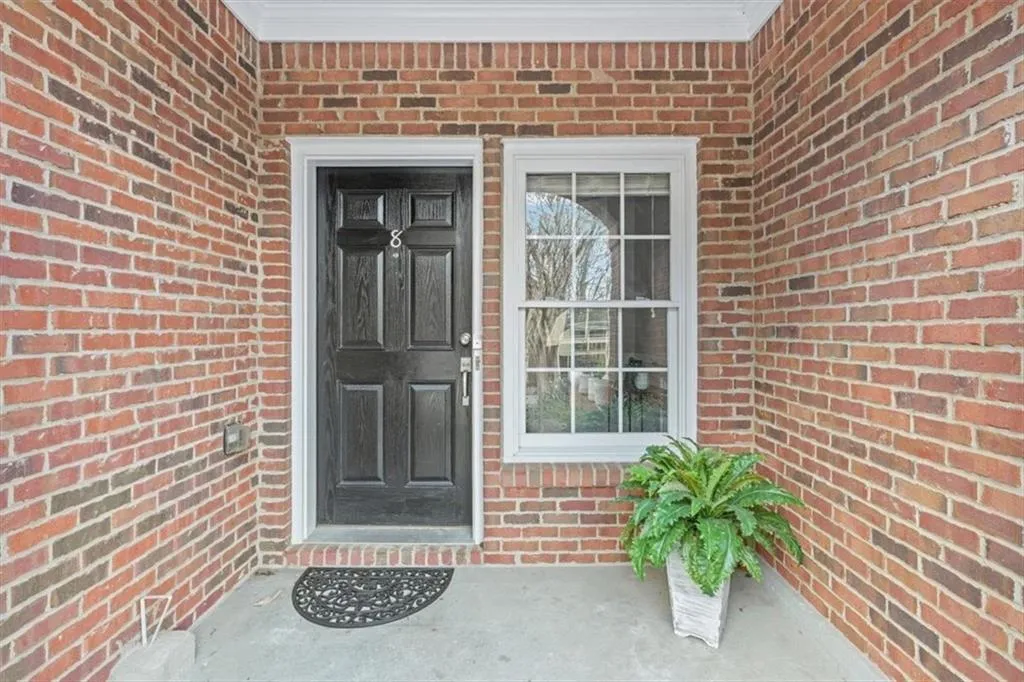 Cozy, covered front porch to greet your guests!