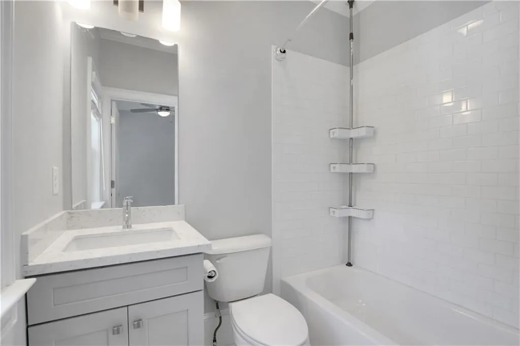 Laundry area upstairs featuring cabinet space, electric dryer hookup, and hookup for a washing machine and utility sink