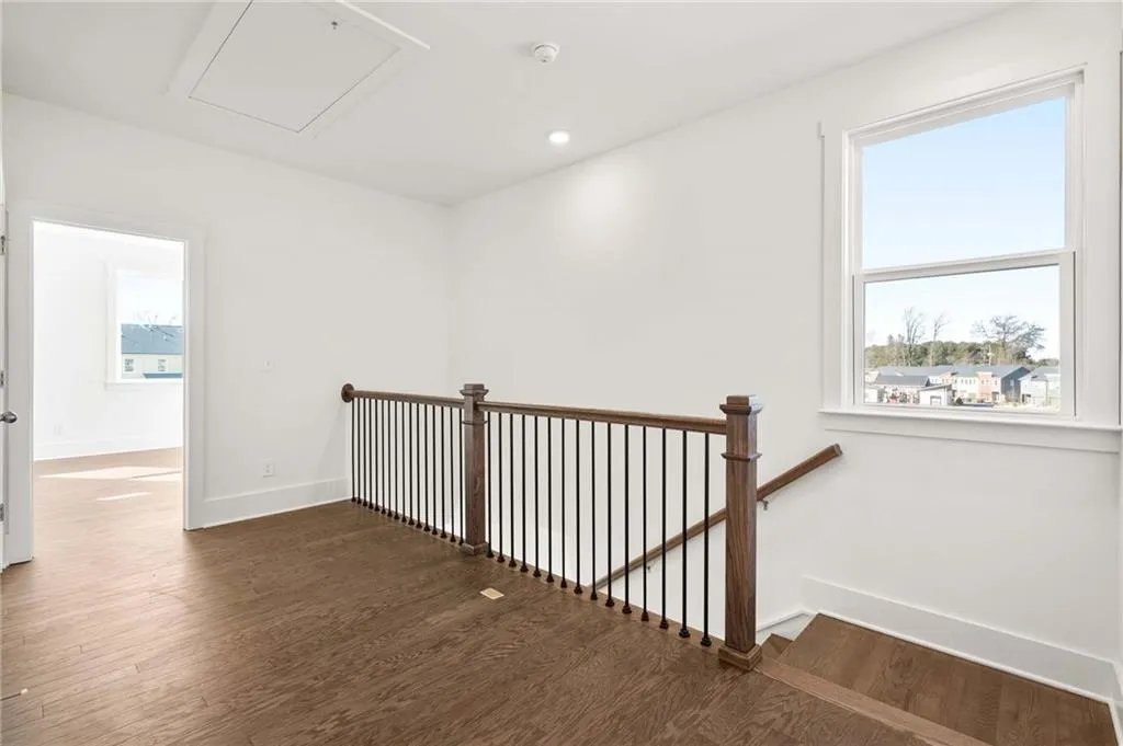 Loft at the 2nd story opens the upstairs space. Photo example only.