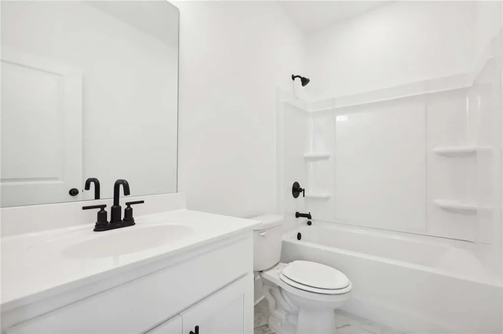 Guest bathroom. Photo example only of finishes.