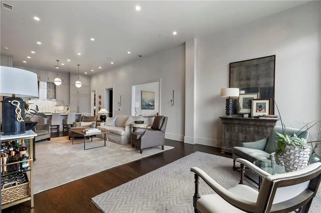 Living area featuring wood finished floors and recessed lighting