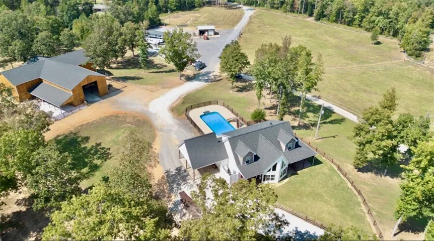 View of rural area with a pool area