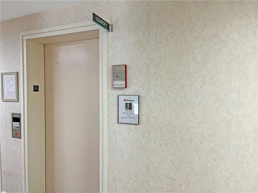 Two elevators near condo