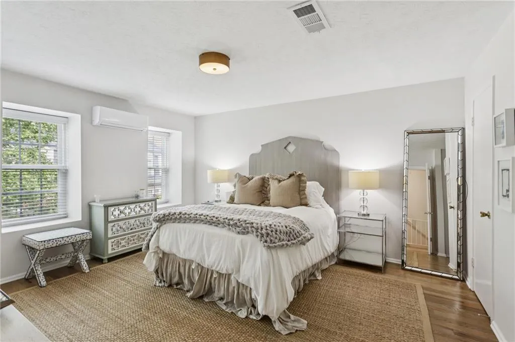 Primary bedroom with walk in closet