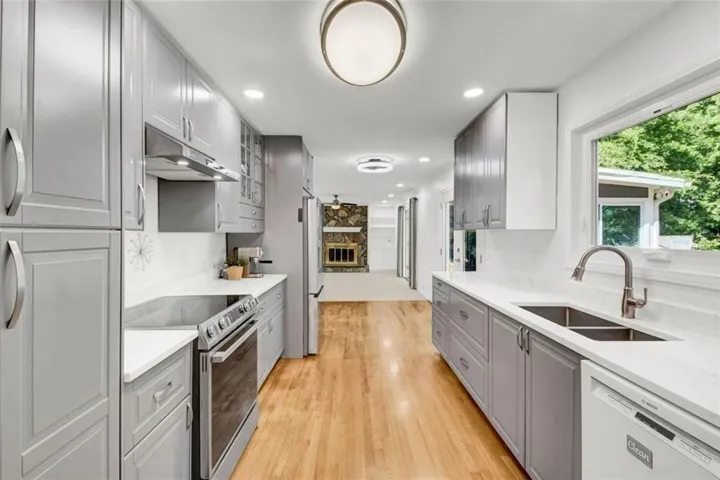 Updated Modern Kitchen with Hardwood, Quartz counters