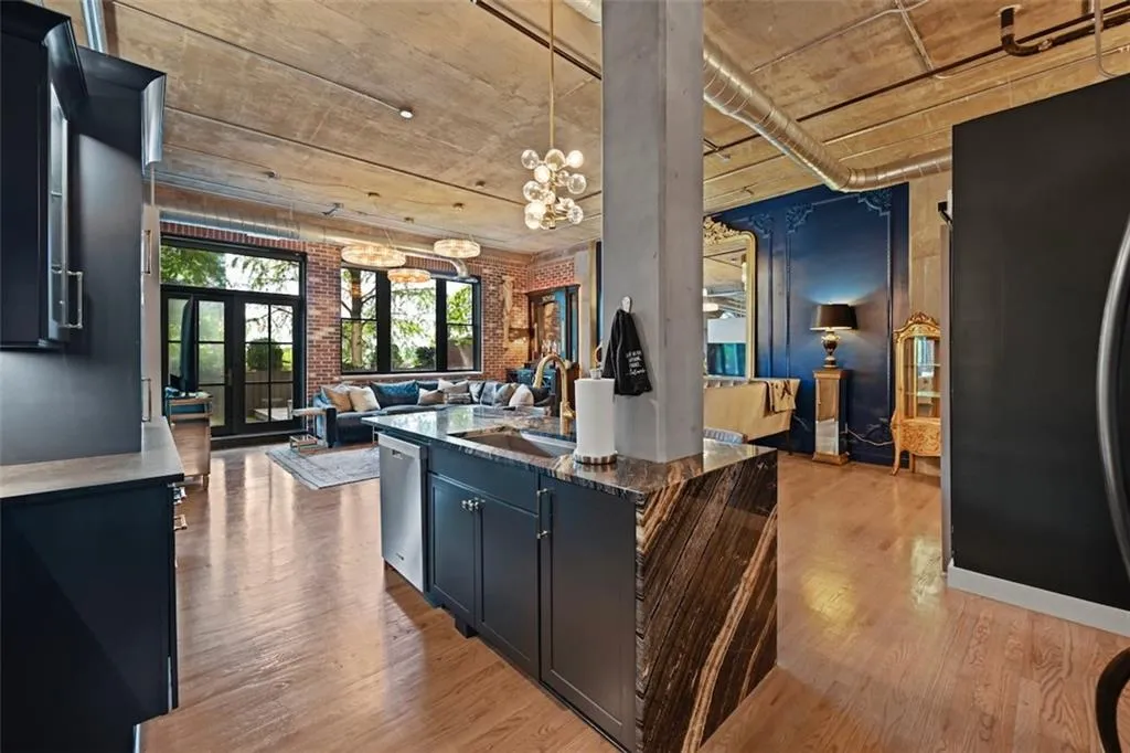 Kitchen featuring dark waterfall bar