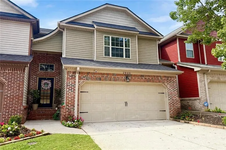 Brick and siding exterior with an integrated two-car garage