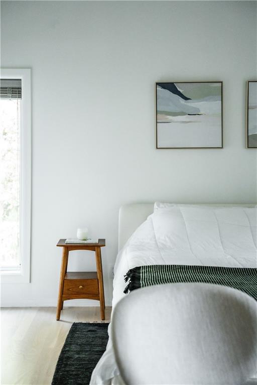 Bedroom with light wood-type flooring