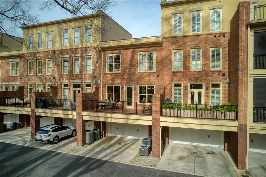 The spacious and convenient 2-car garage provides ample space for parking and additional room for organization, enhancing the practicality and functionality of the townhome while offering secure, direct access to the residence.