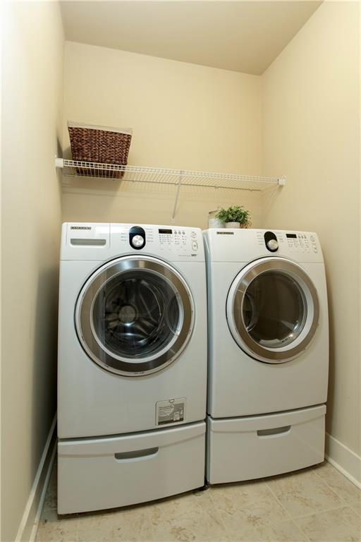 A convenient laundry room serves the second-level bedrooms.