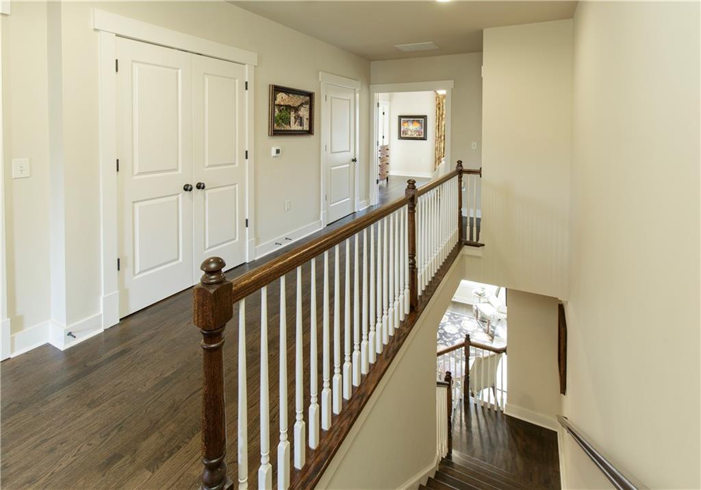 The strategically integrated elevator shaft within the townhome, offering the potential for installing an elevator that services all three levels. This feature adds a unique element of convenience and future adaptability, or alternatively, it can be used as substantial walk-in closet space on each level.
