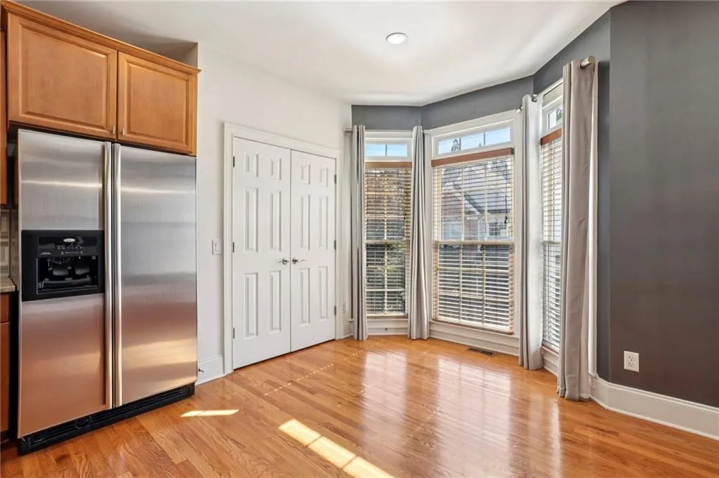 Double door to pantry and another sitting area in the kitchen.