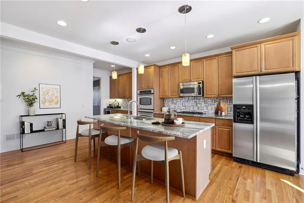 Comfort and spacious kitchen with stainless steel appliances.