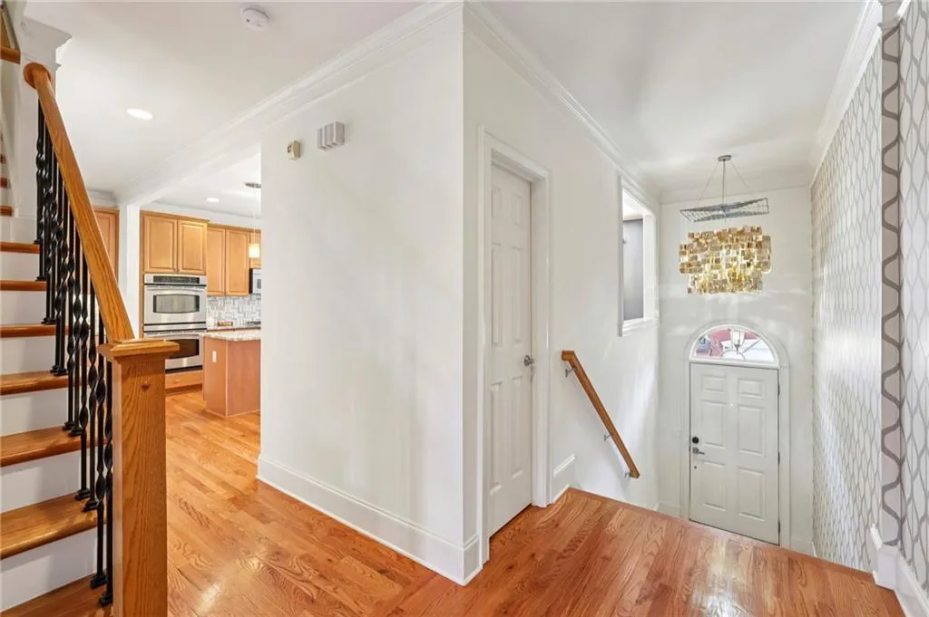 Welcome inside your beautiful entry to greet family and friends into your new home. Gorgeous hardwood floors on all three levels.