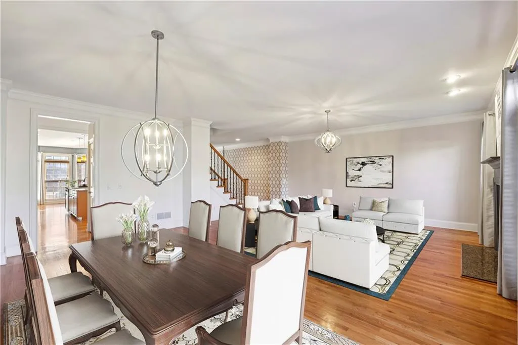 Main level with view towards the kitchen and foyer.