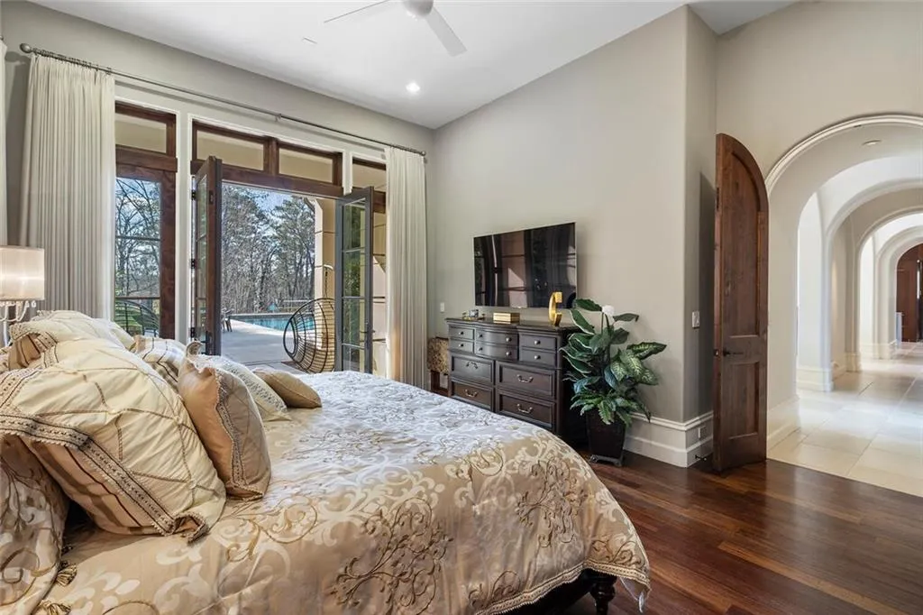 Second primary on main with doors out to the pool.
