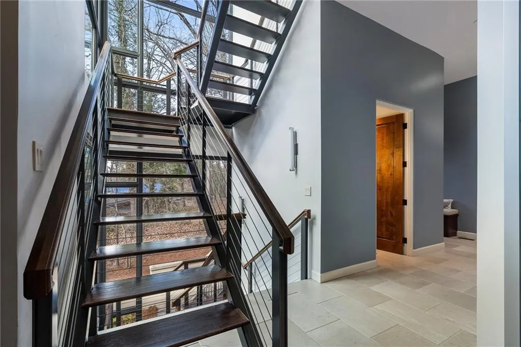 Second architectural stair enclosed in glass.