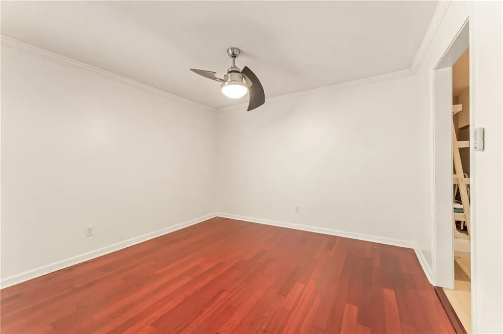 Nicely sized Dining Room with modern fan could also be utilized as a home office.