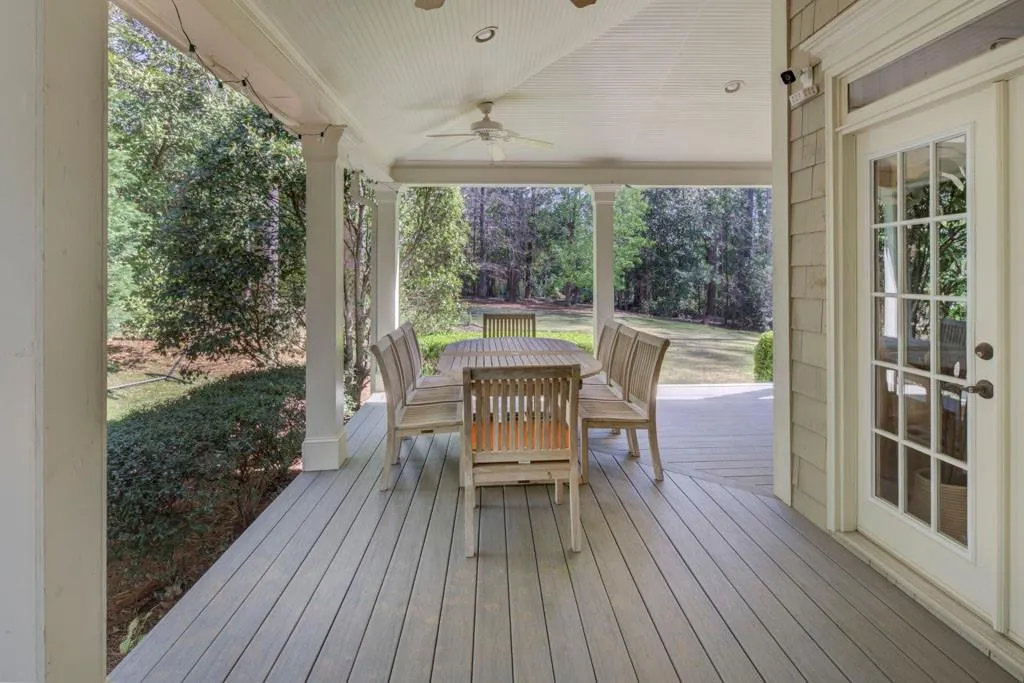 Wrap around covered porch to large flat back yard