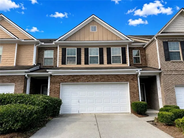 Brick facade with a two-car garage