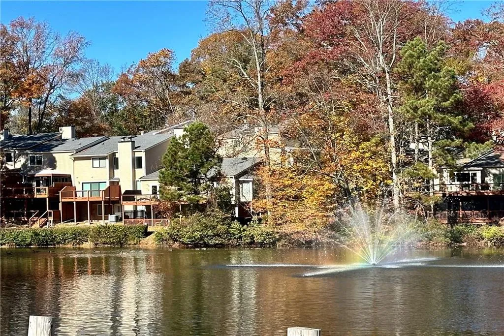 Water view featuring a tree filled landscape