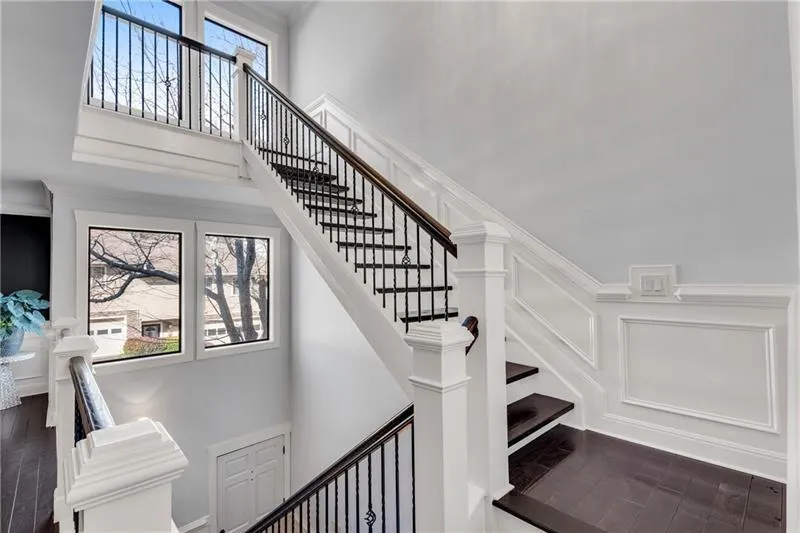Staircase from Living Areas & Kitchen Level to Upper Level.