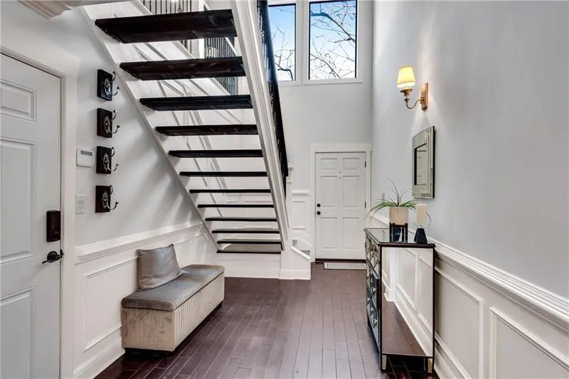 Three-Story Entry Foyer is bathed in Natural Light.