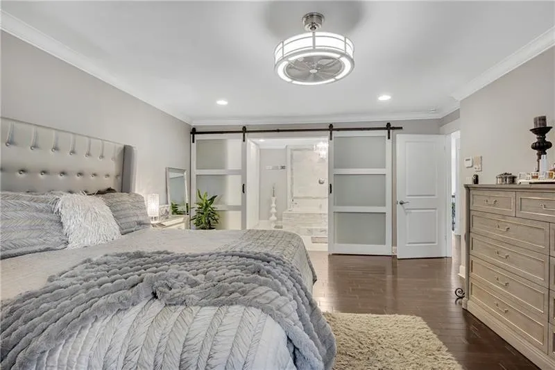 Primary BR with View to Updated, Luxurious En-Suite Marble Bath.