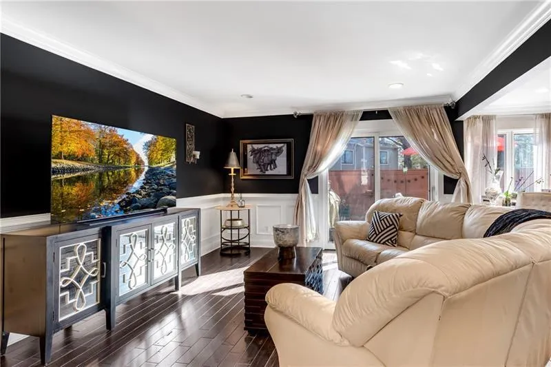 Casual-Living Family Room with crown molding and french doors