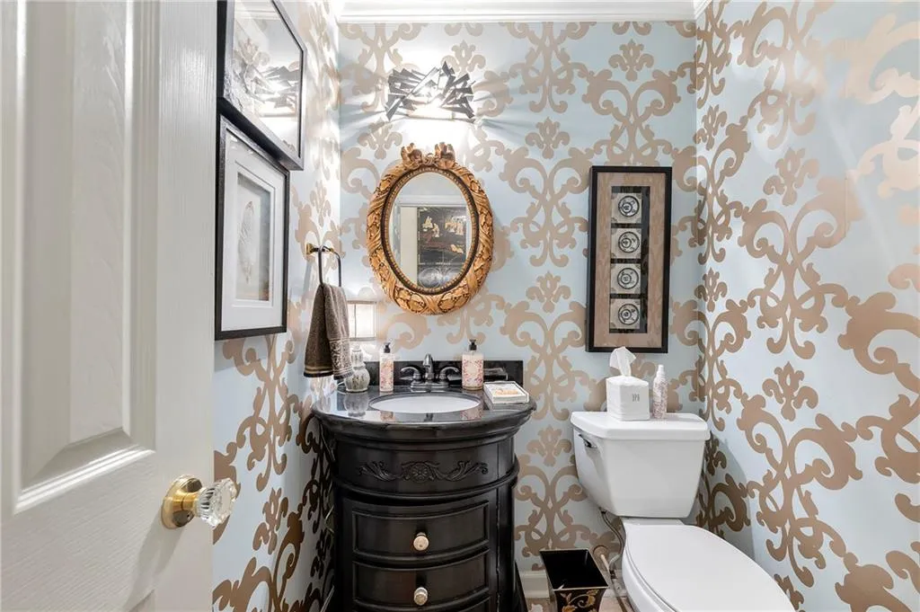 Bathroom with vanity and toilet