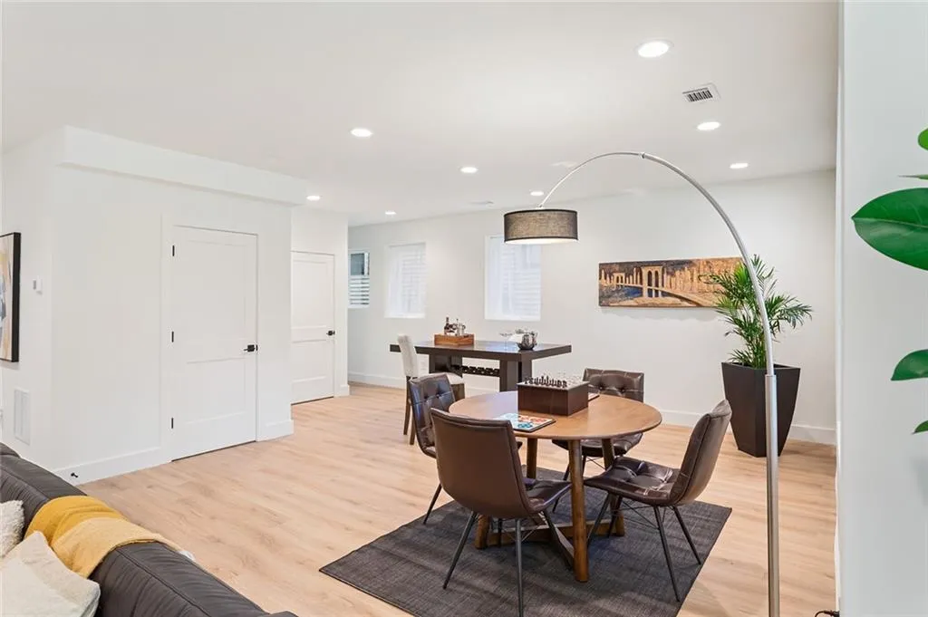 Dining area featuring recessed lighting and light wood-type flooring