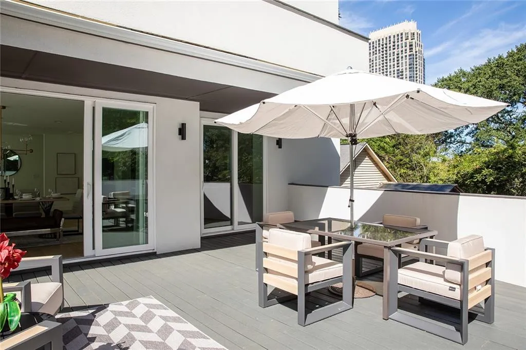 Wooden terrace featuring outdoor dining space