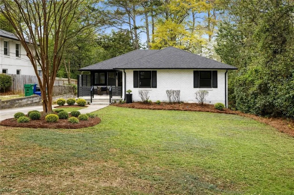 Note this is an example of what it might look like painted - the home is currently the natural brick color