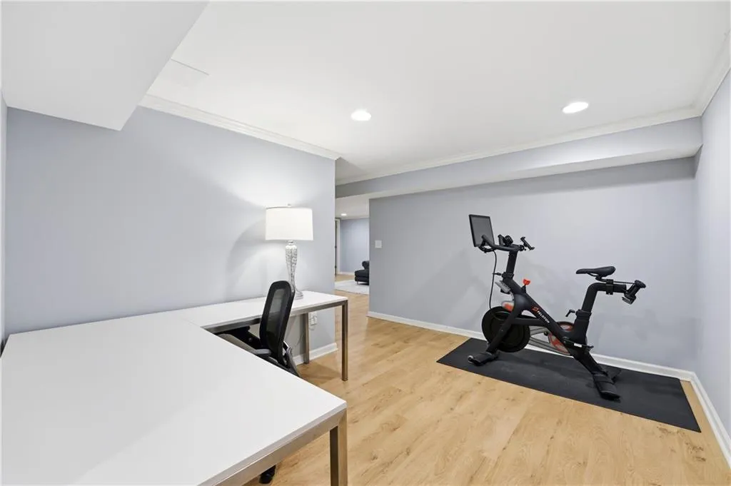 Flex Space / Office + Fitness AreaVersatile lower-level space suitable for a home office, workout area, or multi-purpose use. Open layout and neutral finishes allow for easy customization based on lifestyle needs.