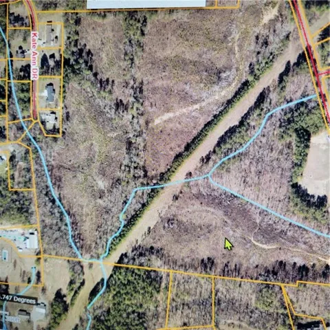 Aerial Survey Map. Depicting property boundaries, topographical features, and drainage patterns across the parcel