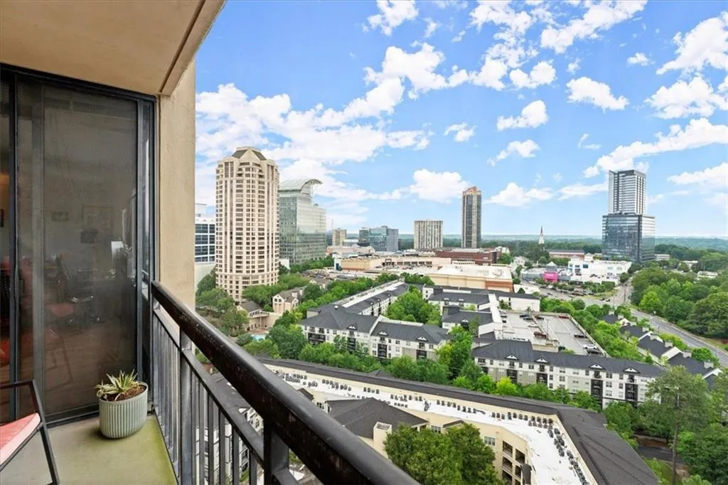 Balcony featuring a view of city