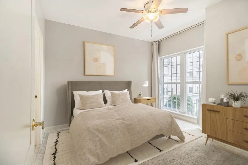 Retreat to the generous Bedroom, complete with a Large Walk-In Closet featuring a Custom Shelving System and a spacious Ensuite Bathroom for ultimate comfort.