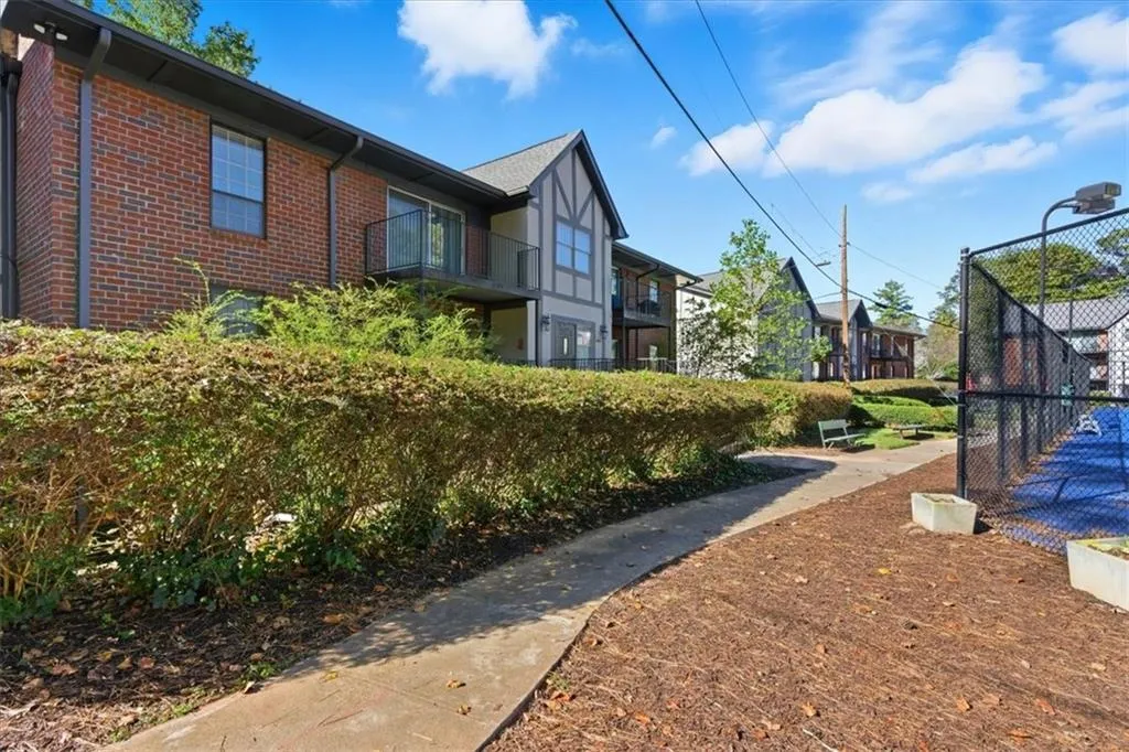View of home's community featuring a balcony and a residential view