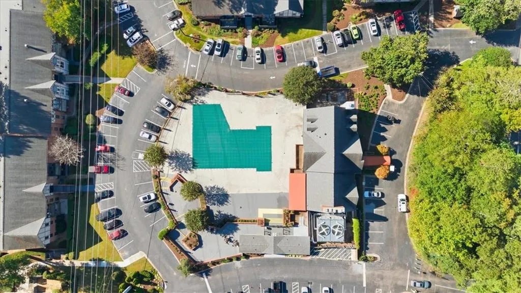 Aerial overview of property's location with a pool area