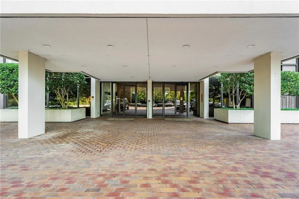 View of patio featuring french doors and a carport