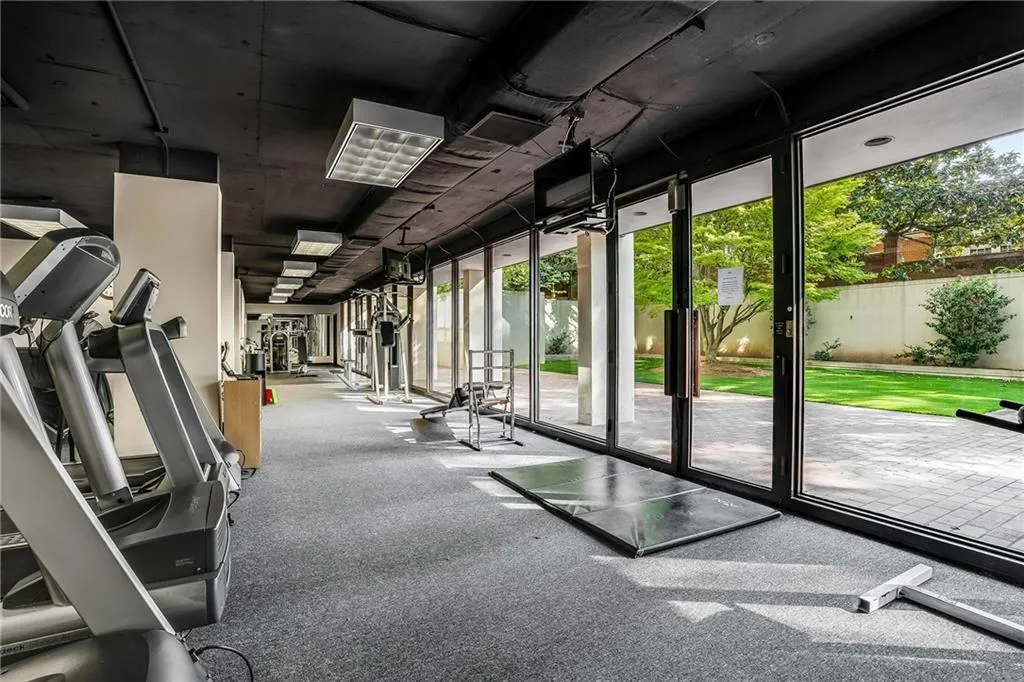 Workout area with floor to ceiling windows