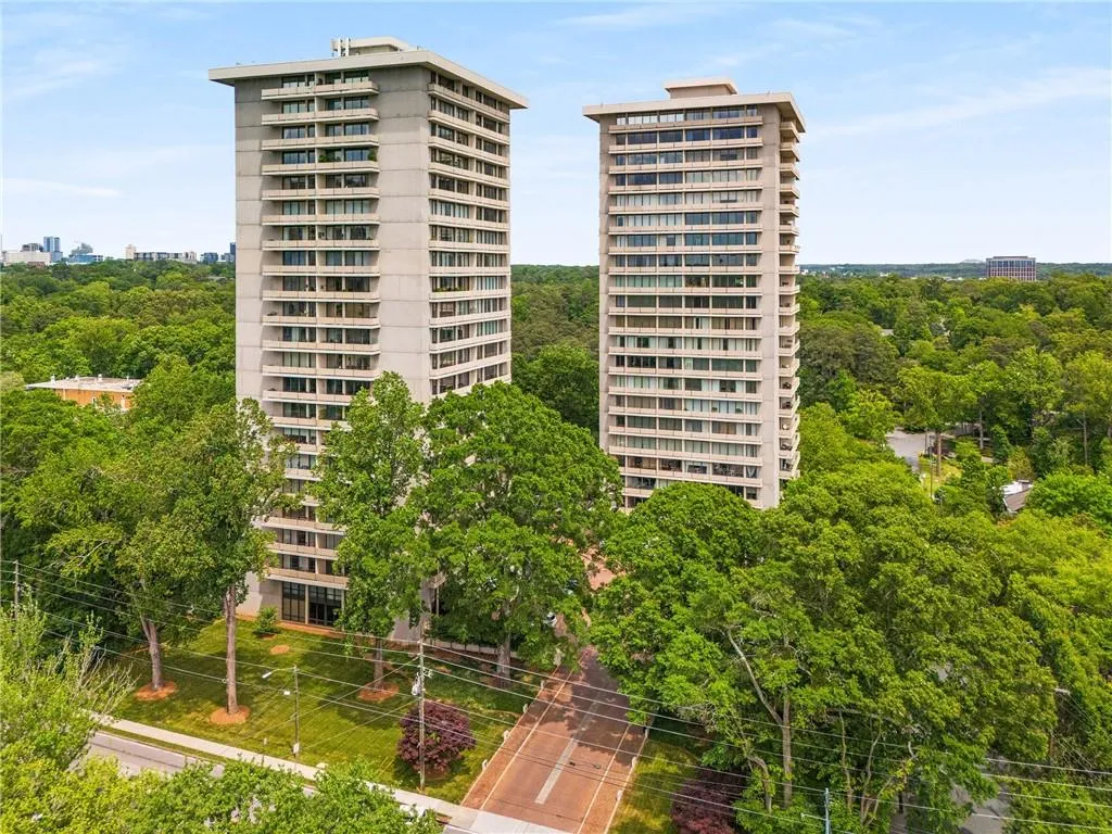 View of building exterior featuring a city view