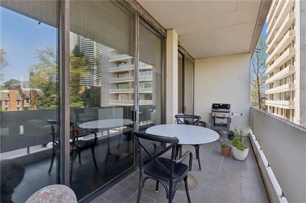 Balcony featuring a grill