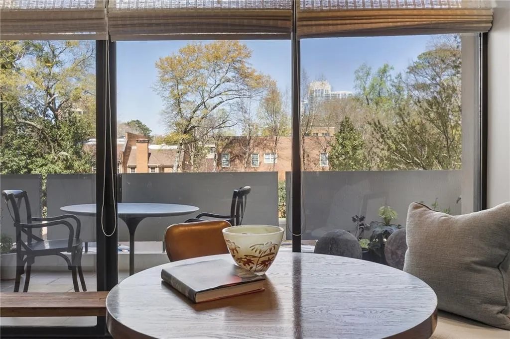 Dining space with floor to ceiling windows