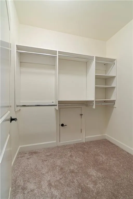 Primary suite closet 1 of 2