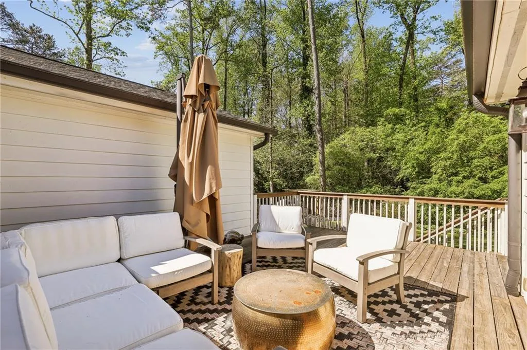 Wooden terrace featuring outdoor furniture