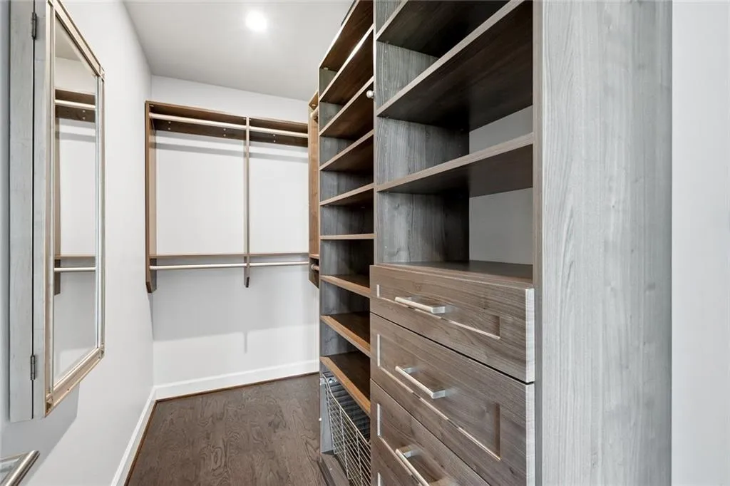 Custom closet system in Primary suite.