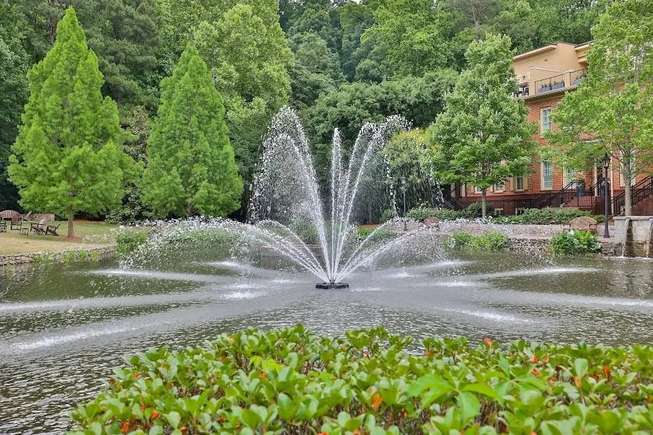 Surrounding community featuring a water view